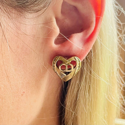 A pair of Dior CD Heart Earrings for Pierced Ears