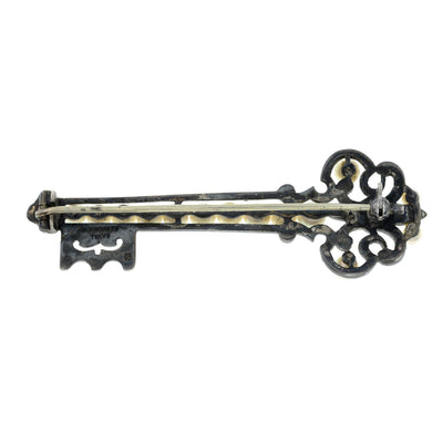 A Vintage Mikimoto Silver and Pearl Brooch in the form of a Key