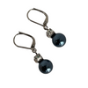 A pair of Givenchy Drop Earrings with Faux Pearl
