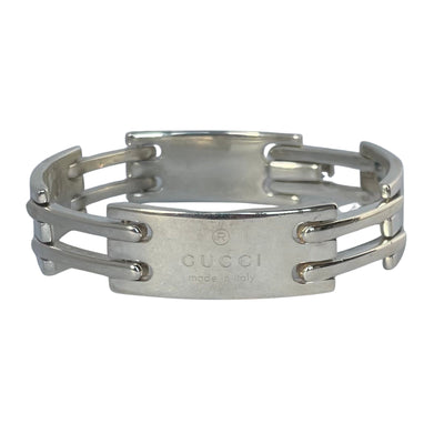 Vintage Gucci men's sterling silver gate-link ID plate bracelet with signature Gucci engraved central plate, white background