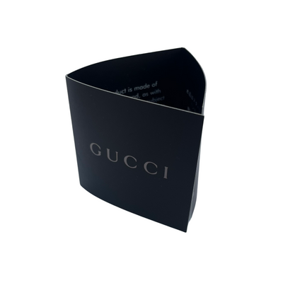 Black Gucci box on a white background
