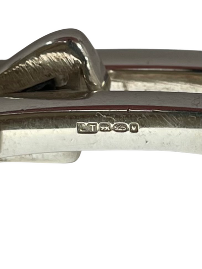 Vintage Gucci men's sterling silver gate-link ID plate bracelet with signature Gucci engraved central plate, white background, showing hallmark