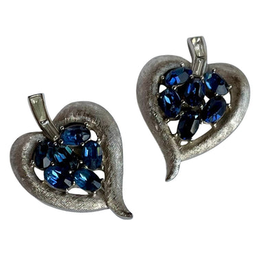 Vintage Crown Trifari cornflower blue oval crystal clip earrings in brushed silver Trifanium, signed, with clear baguette stones. Alfred Philippe era, 1960s.
