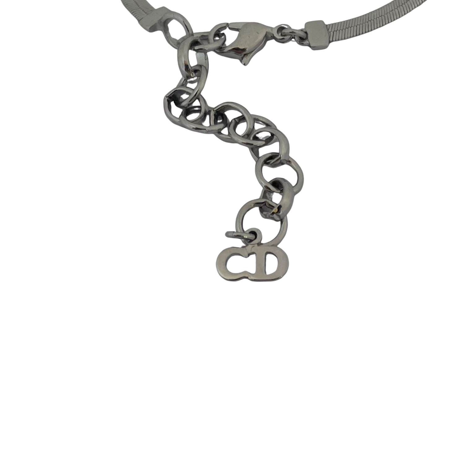 Christian Dior silver-tone bracelet with knotted bow detail and CD initial charms, John Galliano era Y2K showing extender chain with CD logo
