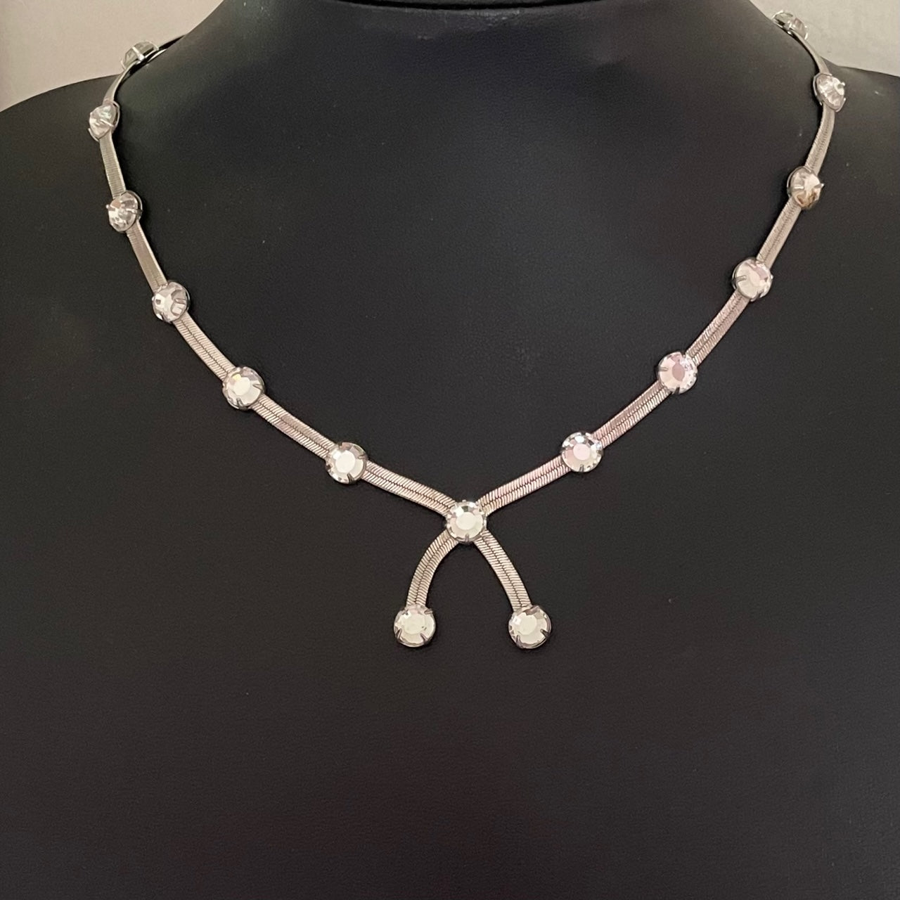 Christian Dior silver herringbone snake chain necklace with crystal Y-drop centrepiece. Signed Dior. Garlands and Ribbons, Galliano era, early 2000s