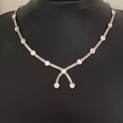 Christian Dior silver herringbone snake chain necklace with crystal Y-drop centrepiece. Signed Dior. Garlands and Ribbons, Galliano era, early 2000s