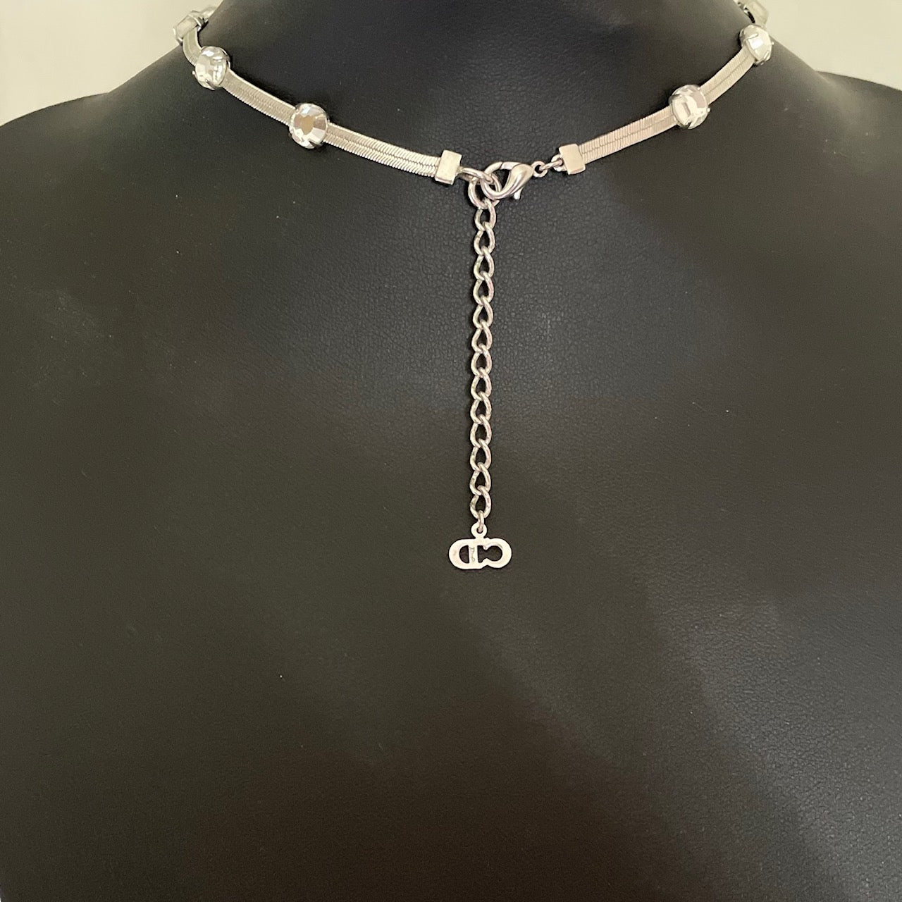 picture shows reverse of Christian Dior silver herringbone snake chain necklace with crystal Y-drop centrepiece. Signed Dior. Garlands and Ribbons, Galliano era, early 2000s