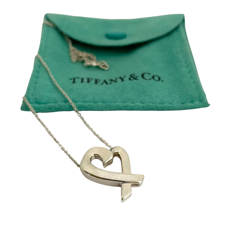 Vintage Tiffany & Co Paloma Picasso Loving Heart sterling silver pendant necklace. Stamped 925. Professionally polished. Comes with Tiffany pouch.