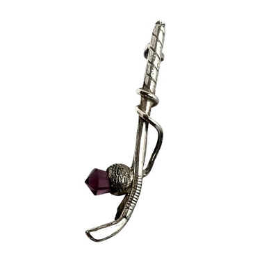 Sterling silver brooch in the form of a golf club with amethyst crystal thistle