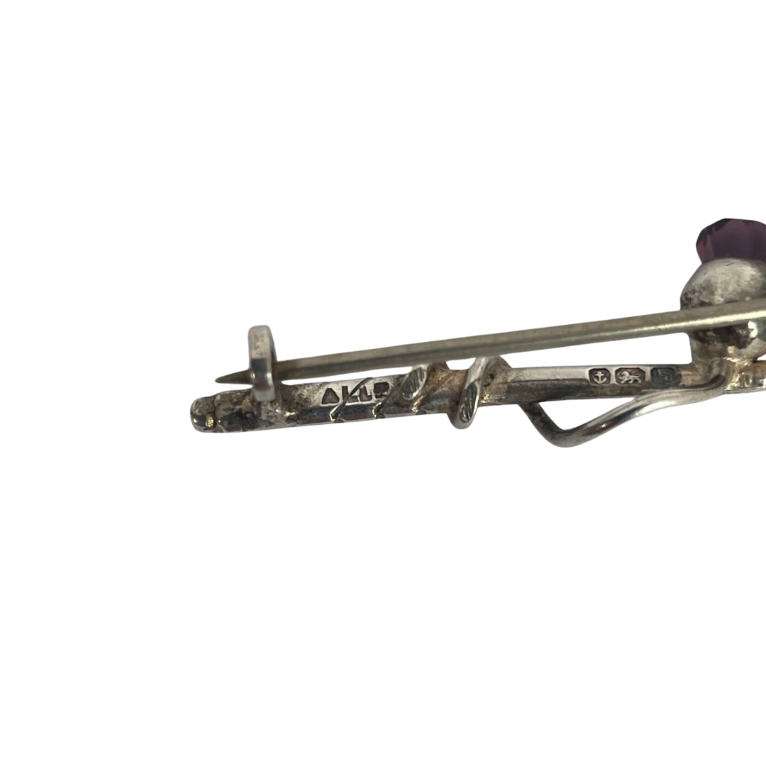 Sterling silver brooch in the form of a golf club with amethyst crystal thistle showing makers marks
