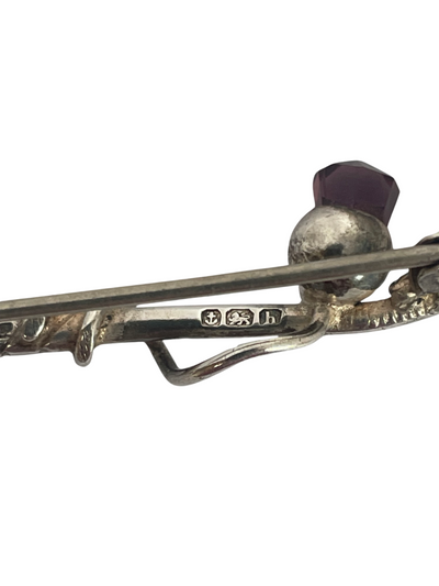 Sterling silver brooch in the form of a golf club with amethyst crystal thistle showing hallmarks