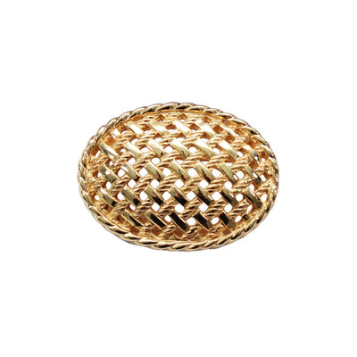 Dior gold plated basket weave brooch on white background
