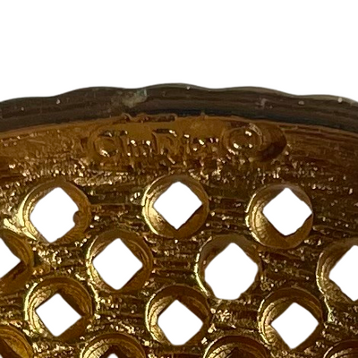 Dior gold plated basket weave brooch showing Dior stamp on white background