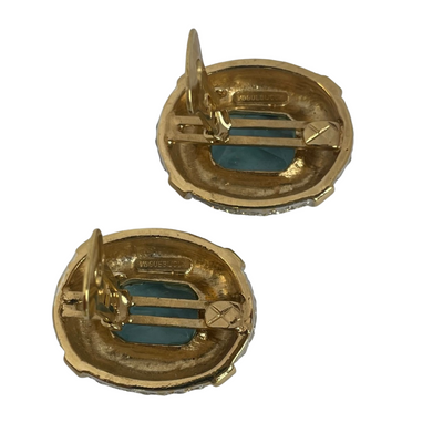 reverse of Vogue Bijoux aqua crystal earrings showing clips open and signature