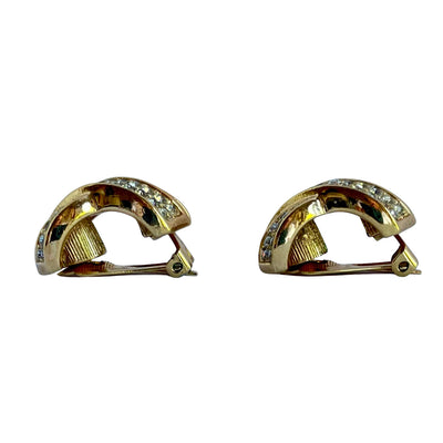 side of vintage Christian Dior gold tone crystal kiss clip earrings 1980s signed Chr. Dior costume