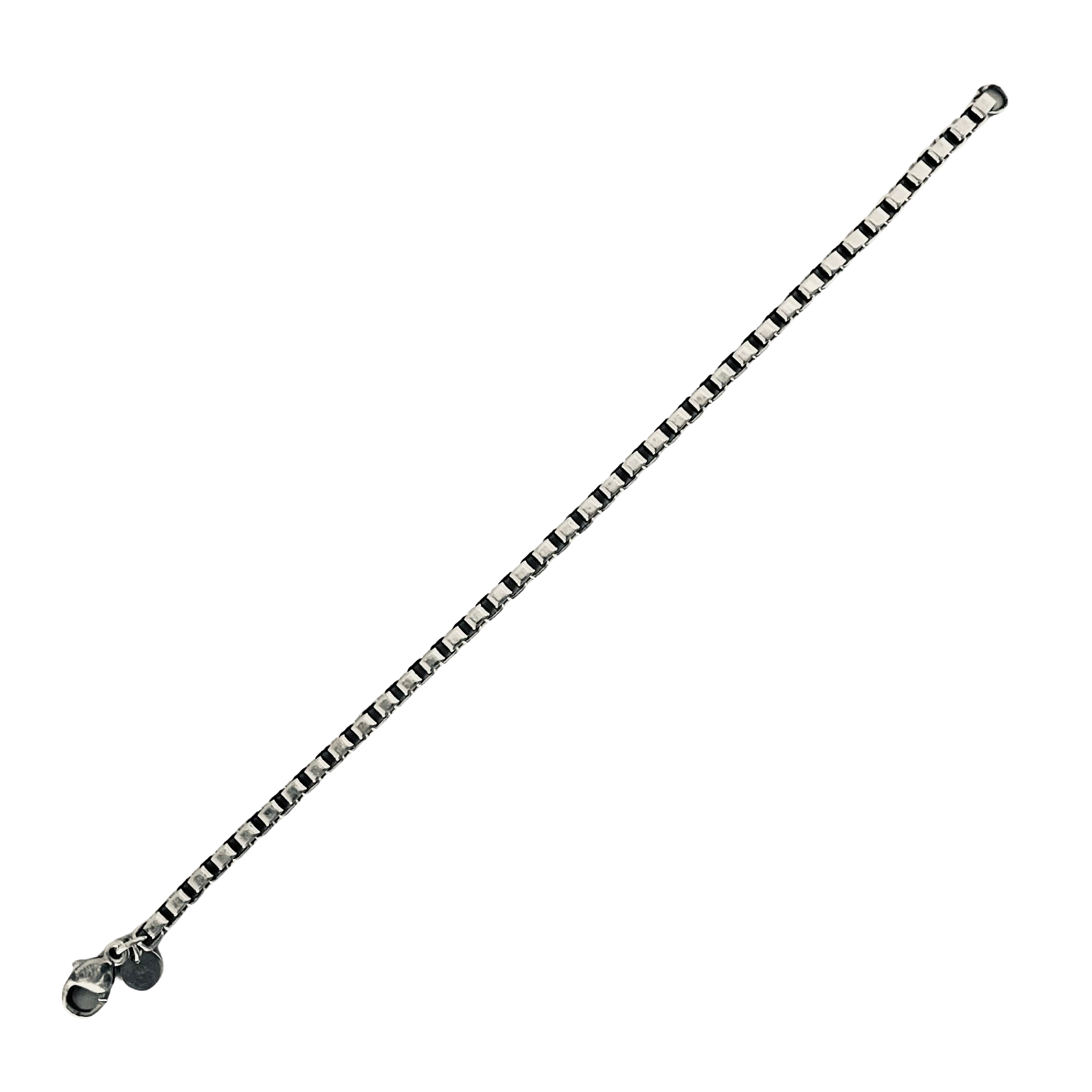 A vintage sterling silver Tiffany & Co. Venetian Link bracelet with square box links and a lobster clasp, on a white background