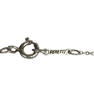 Tiffany and Co. Elsa Peretti sterling silver teardrop pendant necklace showing the Peretti mark