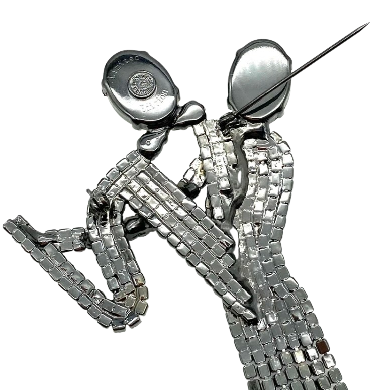 Reverse side showing hallmark of large Butler & Wilson Limited Edition Dancing Couple brooch featuring a lilac Swarovski crystal dress with seven articulated strands and a crimson crystal tuxedo.