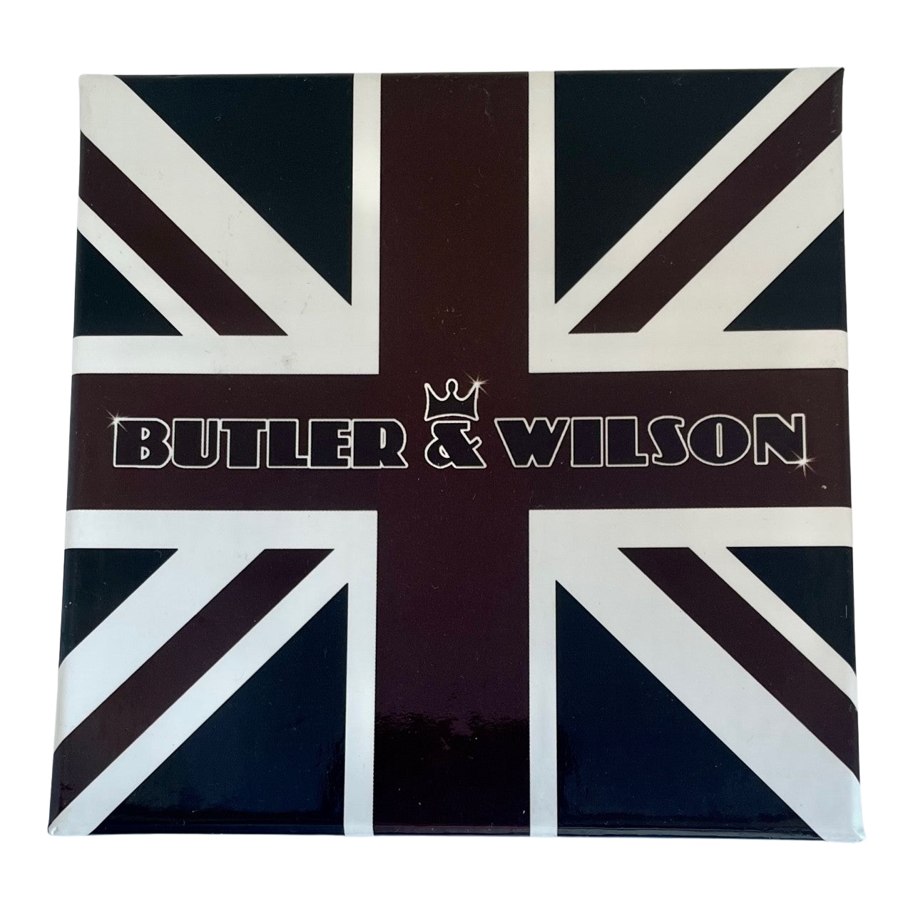 Butler and Wilson Art Deco brooch of a flapper lady in red enamel walking a gold glitter hound dog in a Union Jack box.