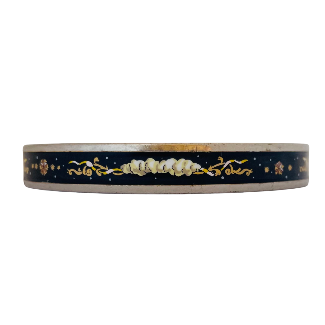 Vintage Hermès Paris enamel bangle, midnight black with multicolour celestial motif of clouds, stars and scrollwork, silver tone, made in Austria by Michaela Frey