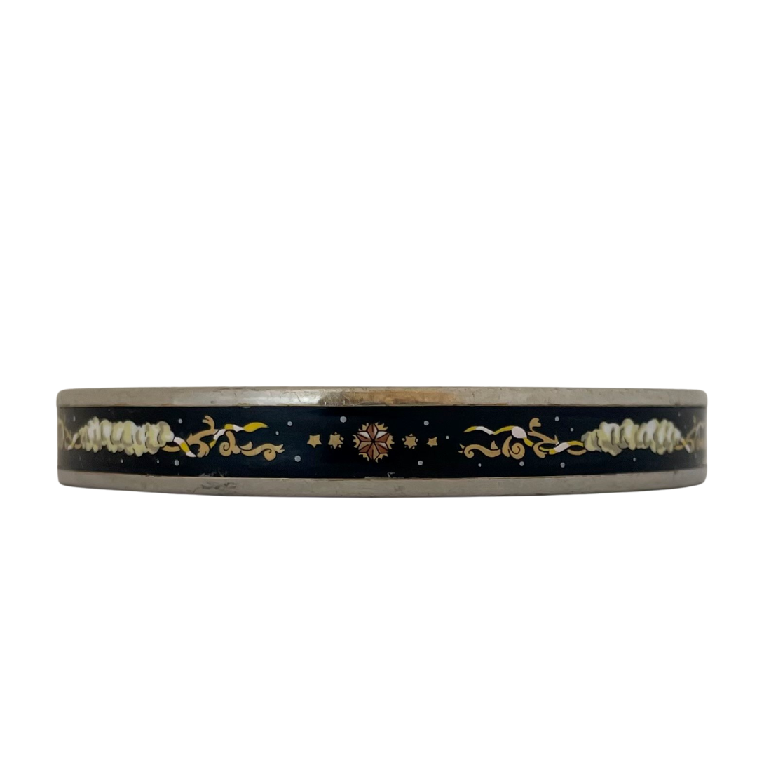 Vintage Hermès Paris enamel bangle, midnight black with multicolour celestial motif of clouds, stars and scrollwork, silver tone, made in Austria by Michaela Frey
