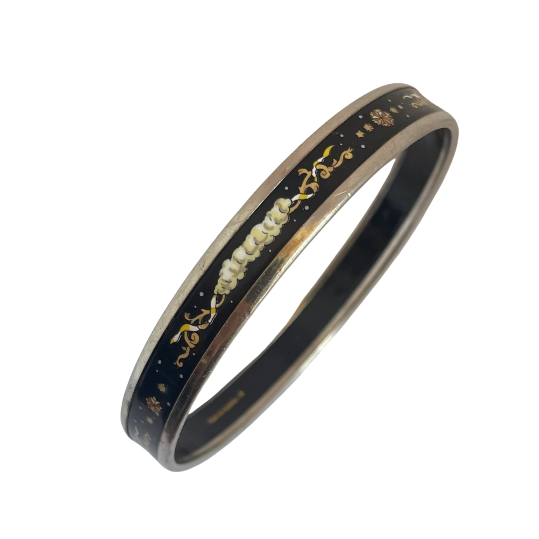 Vintage Hermès Paris enamel bangle, midnight black with multicolour celestial motif of clouds, stars and scrollwork, silver tone, made in Austria by Michaela Frey