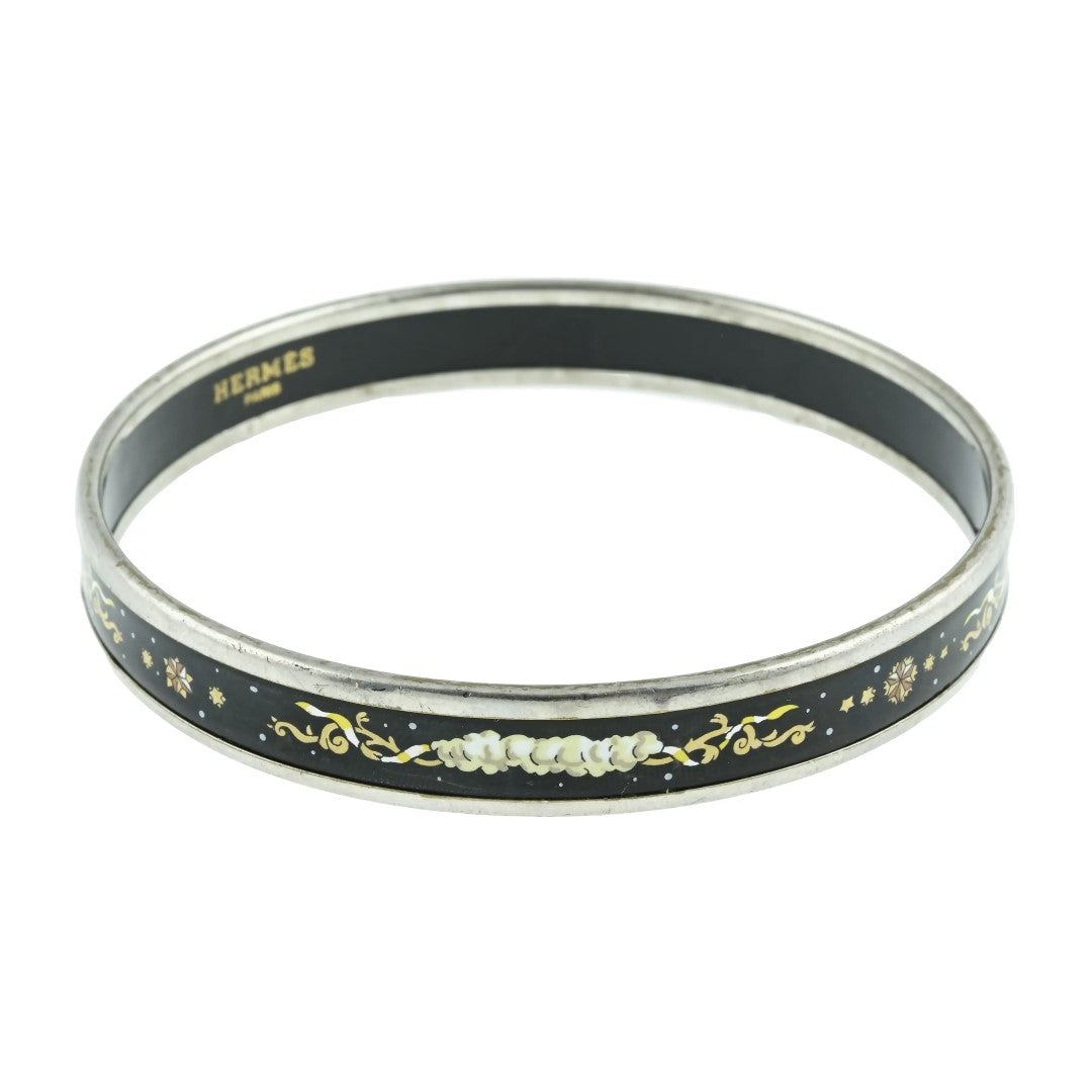 Vintage Hermès Paris enamel bangle, midnight black with multicolour celestial motif of clouds, stars and scrollwork, silver tone, made in Austria by Michaela Frey