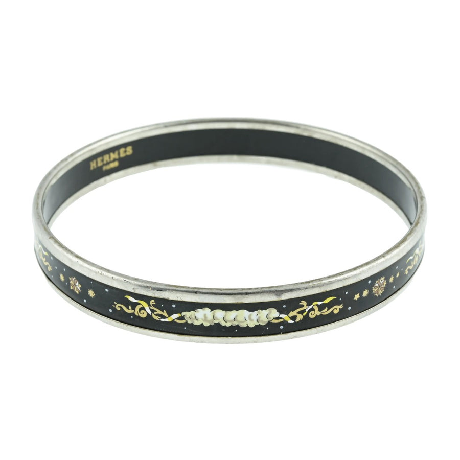 Vintage Hermès Paris enamel bangle, midnight black with multicolour celestial motif of clouds, stars and scrollwork, silver tone, made in Austria by Michaela Frey