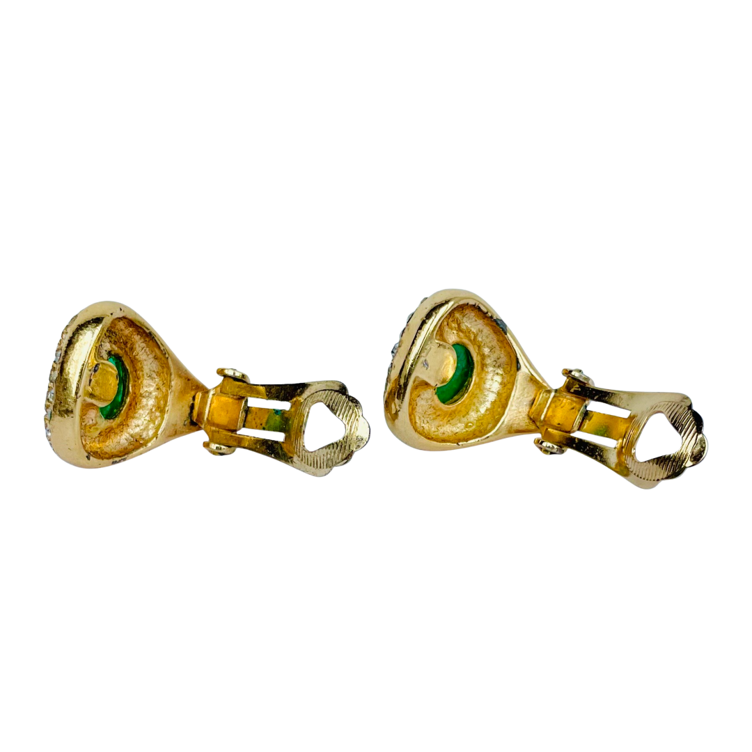 Reverse of vintage Christian Dior clip earrings showing gold tone clip fittings open