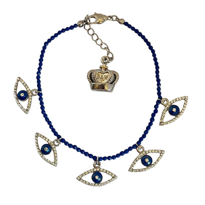 Butler & Wilson crystal eye bracelet with lapis blue beads and crown charm