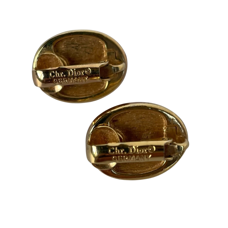 signed Christian Dior Germany signature hallmark on gold-plated back clips of 1980s vintage faux pearl earrings for Annabel James.