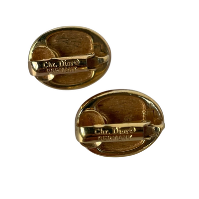 signed Christian Dior Germany signature hallmark on gold-plated back clips of 1980s vintage faux pearl earrings for Annabel James.
