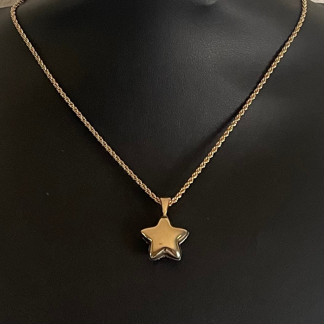 reverse of vintage Alpha Jewels 22ct gold plated puffed star necklace with detachable reversible pendant, pavé crystal front and polished gold reverse.