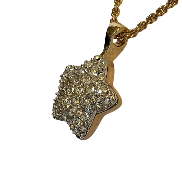 Vintage Alpha Jewels 22ct gold plated puffed star necklace with detachable reversible pendant, pavé crystal front and polished gold reverse on a white background.