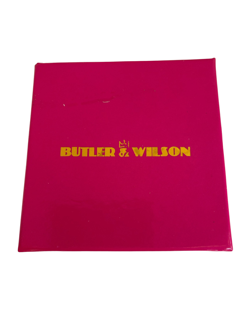 A Butler & Wilson Vintage Hand Holding Crystal Pink Ribbon Brooch