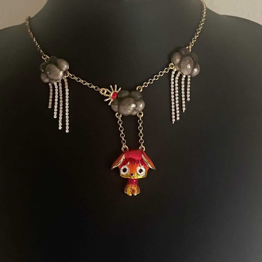 A Vintage Butler & Wilson Dog and Paws Necklace