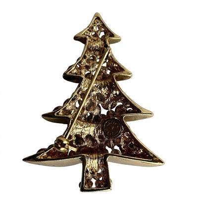 reverse of gold tone Butler & Wilson Christmas Tree brooch showing Butler & Wilson backstamp in circular cartouche and fully functional pin mechanism.