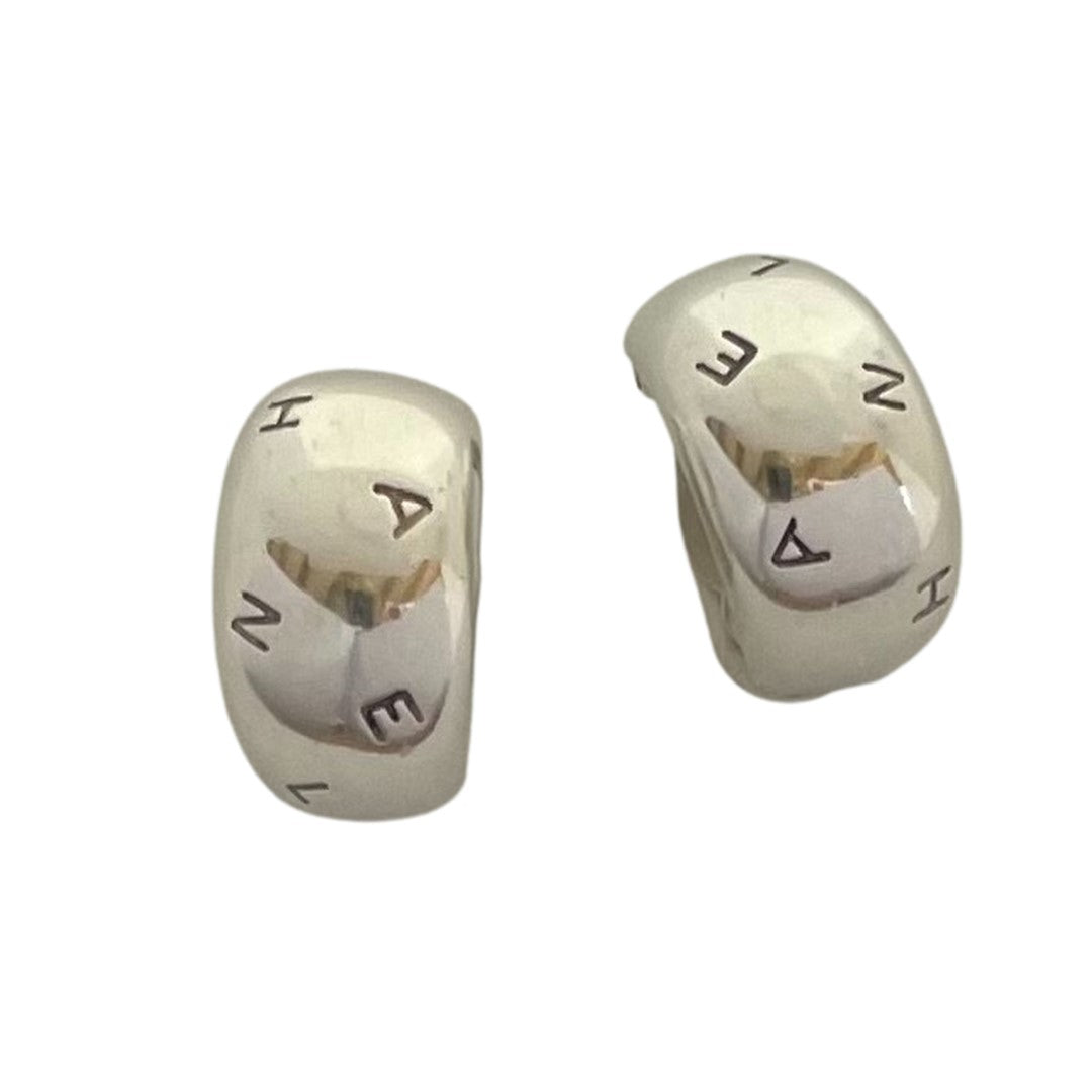 A pair of Vintage Chanel Silver Letters Earrings