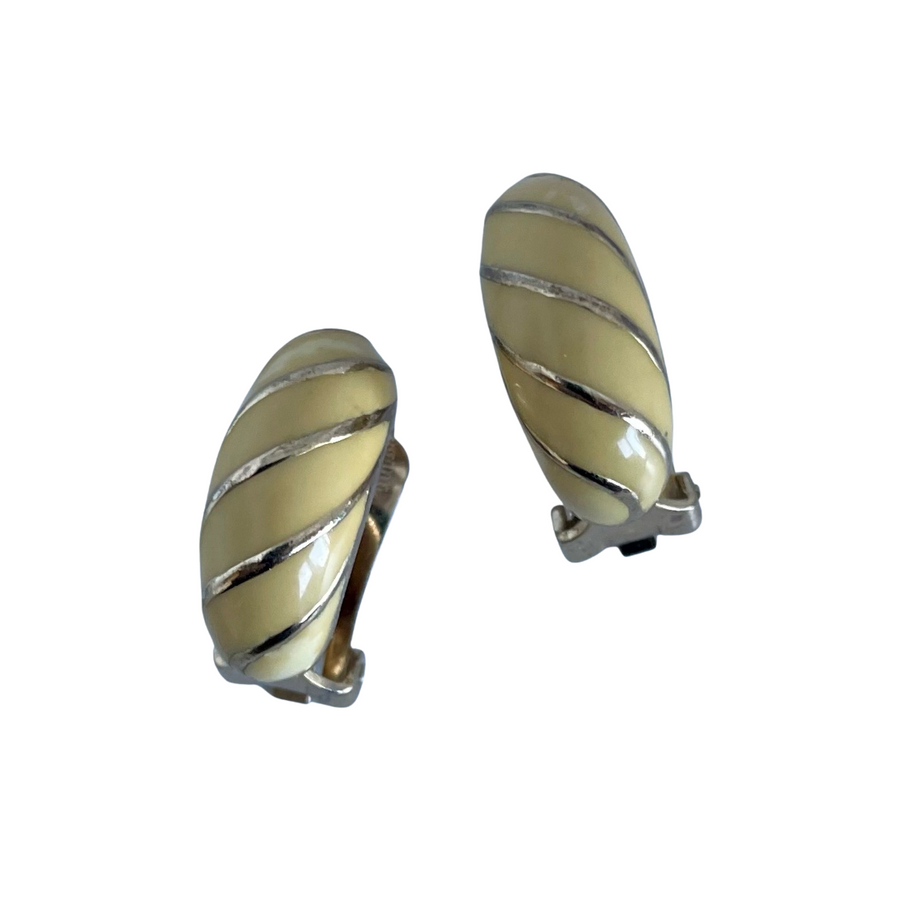 A pair of Vintage Christian Dior Cream Enamel Clip Earrings
