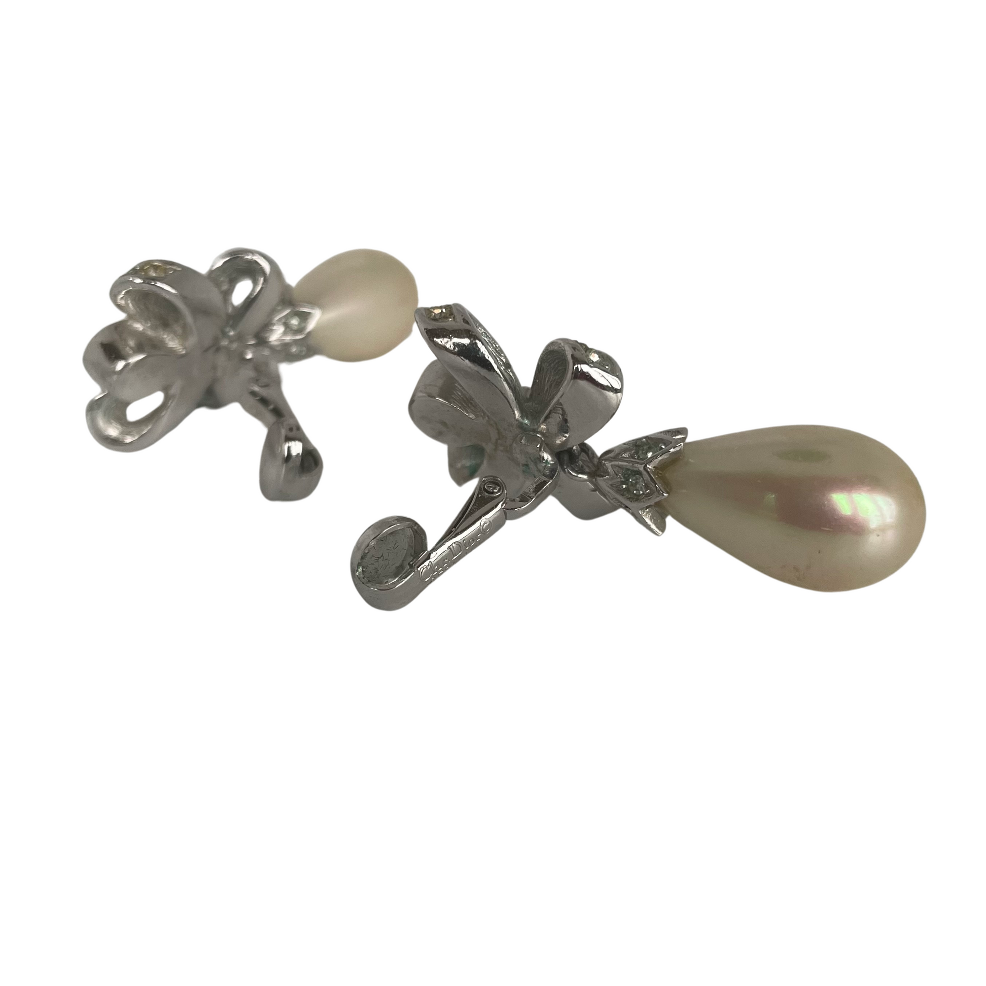 A Pair of  Vintage Christian Dior Crystal Bow Clip Earrings With Drop Faux Pearl