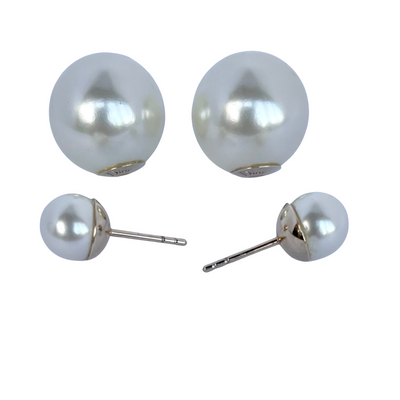 Dior Tribales earrings shown disassembled into front resin pearl studs and large engraved backing pearls.