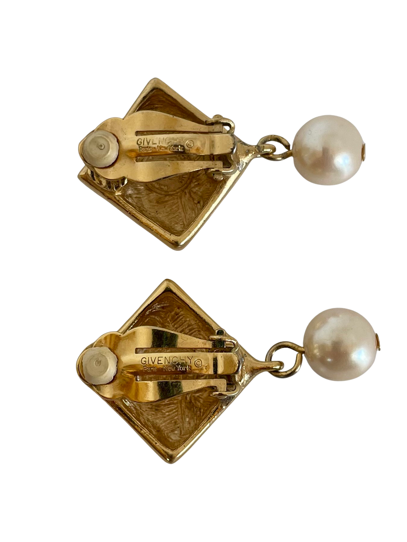 A pair of Vintage Givenchy Clip On Earrings with Drop Pearl