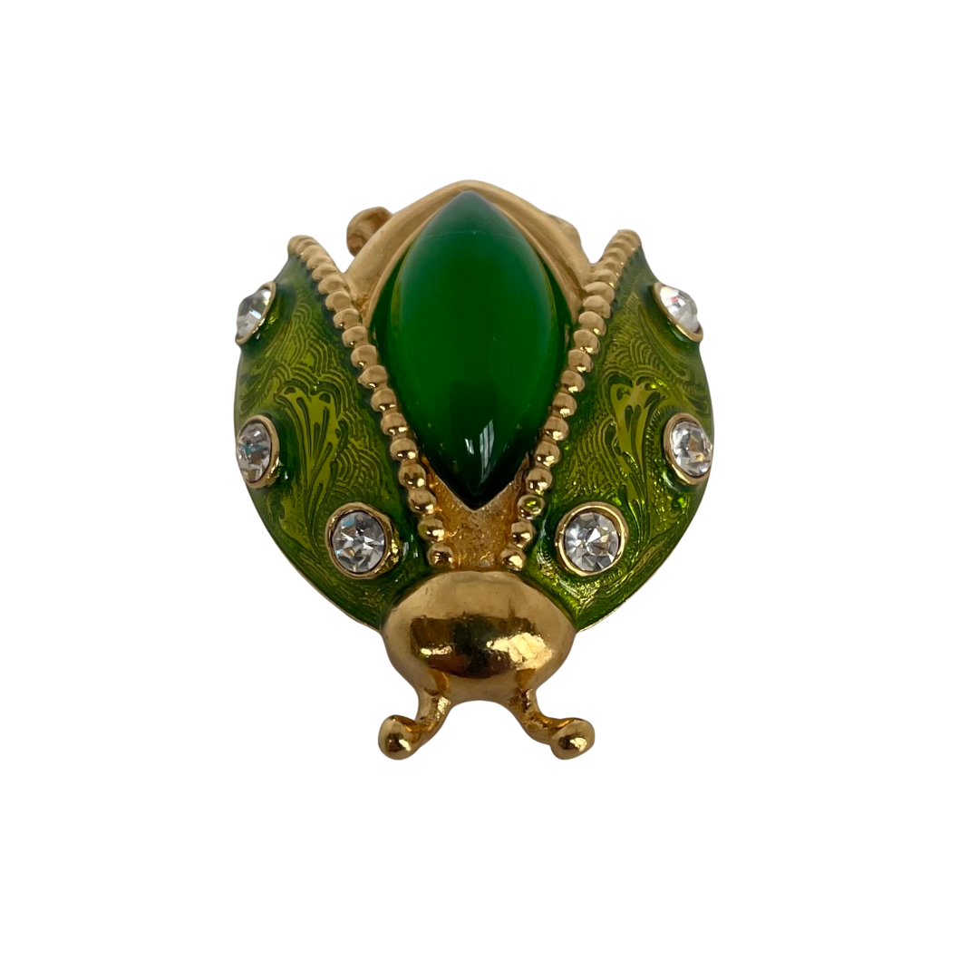 1980s vintage Christian Dior Parfums ladybird brooch with green enamel, gold-plated finish, and sparkling crystals