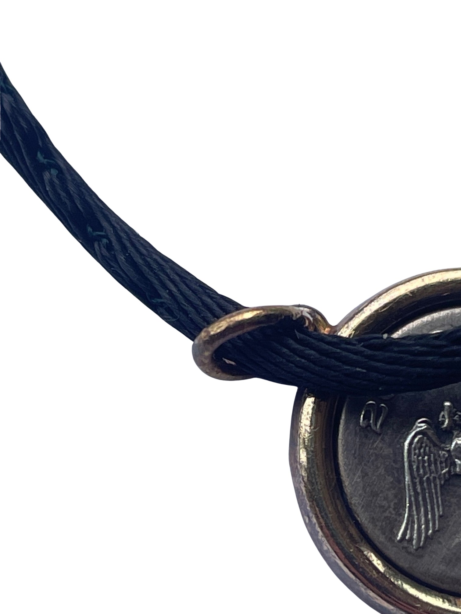 Close-up of the solid 18K yellow gold pendant bail ring showing the official 750 gold purity hallmark stamp.