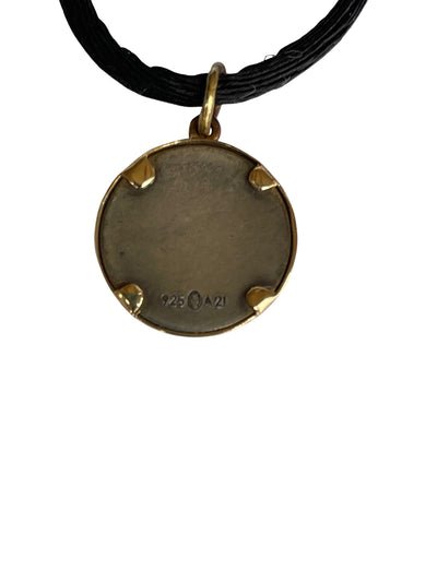 Close-up of the reverse side of a vintage Ilias Lalaounis pendant showing crisp 925 sterling silver purity stamps and the official A21 Athens workshop maker's mark.