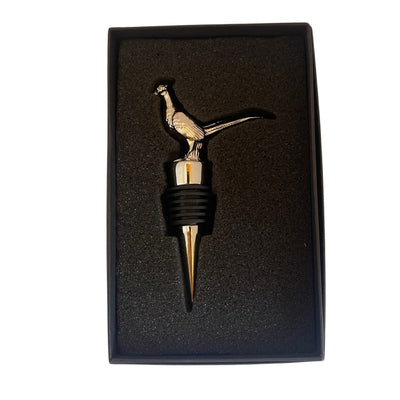 A stainless steel bottle stopper with a beautifully detailed pheasant head shown in its box
