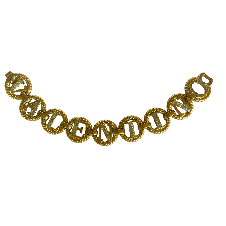 Gold tone Valentino chain link bracelet spelling Valentino