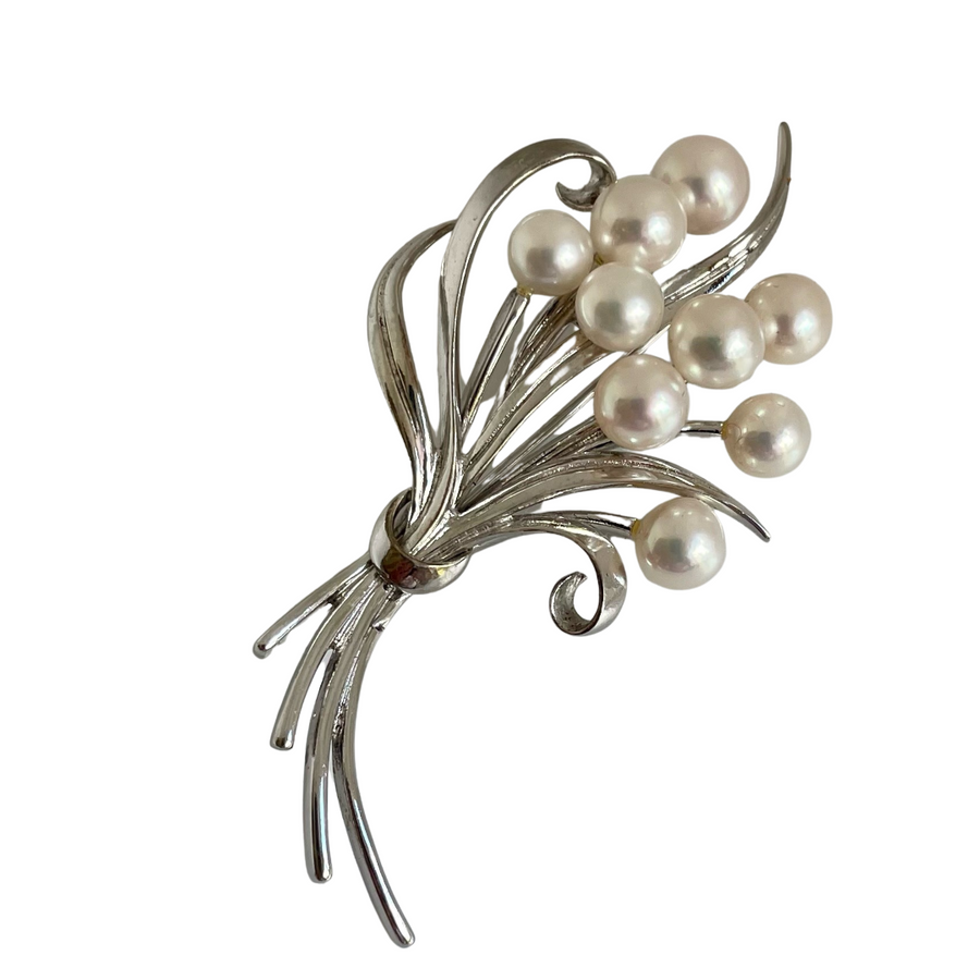 A Vintage Mikimoto Silver and Pearl Bloom Brooch
