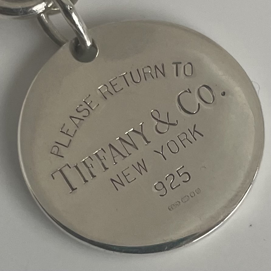 A Tiffany & Co. Vintage Round Tag Return to Tiffany Silver