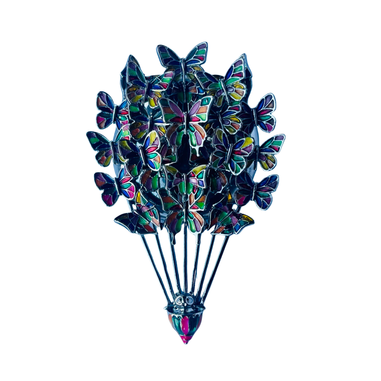 Butler & Wilson vintage hot air balloon brooch set with multicoloured 3 dimensional butterflies. On white background.